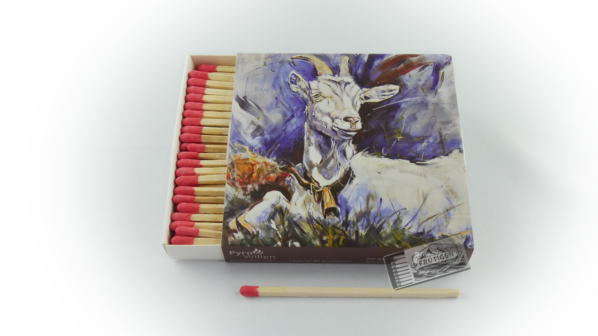 Quadratische Zündholzschachtel mit einem gemahlenen Bild = Ziege vom Künstler Björn Zryd